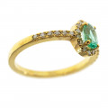 Rosette Engagement Gold Ring adorned with an Emerald and Diamonds