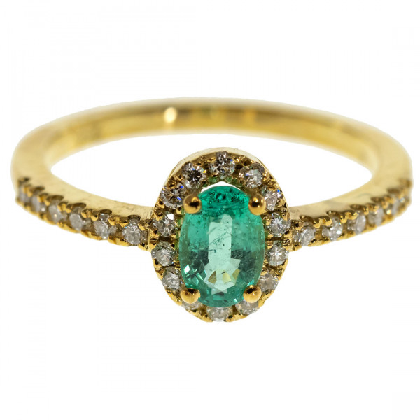 Rosette Engagement Gold Ring adorned with an Emerald and Diamonds