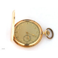 Gold Pocket Watch with Jewels in its mechanism