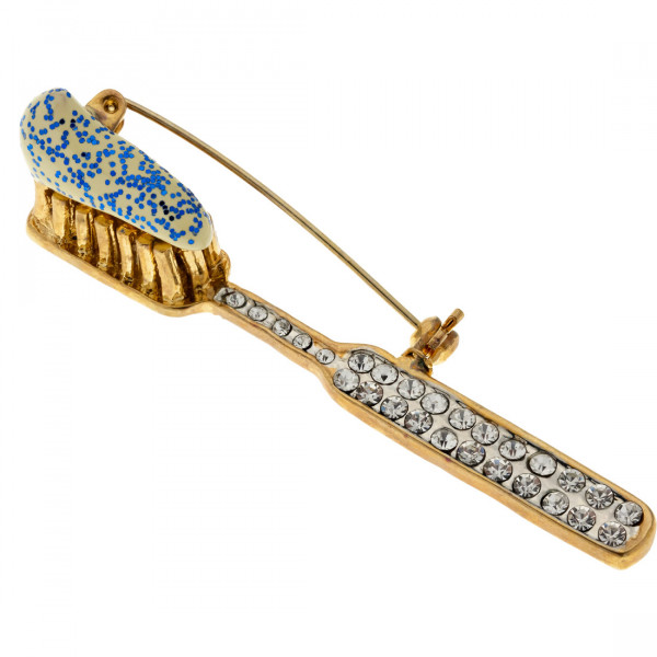 Pin Eisenberg Ice decorated with Swarovski Crystals in a toothbrush-toothpaste design