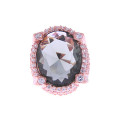Ring with a Smokey Topaz, White Sapphires and Pink Gold Plating