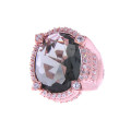 Ring with a Smokey Topaz, White Sapphires and Pink Gold Plating