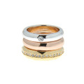 Three rings with platinum, yellow and pink gold plating with white sapphires