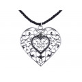 Necklace with a thick black cord and a metal perforated heart with white sapphires from the collection "BE MINE" by Marilou