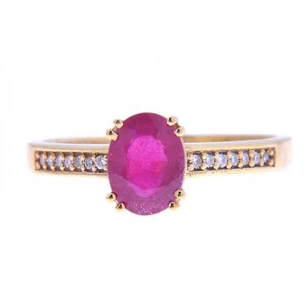 14K Gold Solitaire Ring adorned with a Ruby accented with Diamonds