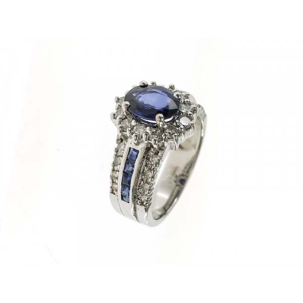 18K White Gold Rosette Ring with an oval cut Ceylon Sapphire, square cut blue sapphires and Diamonds