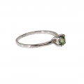 14K White Gold Ring adorned with a Green Sapphire