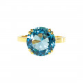 Cocktail Gold Ring adorned with a Blue Topaz