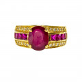 18K Gold Ring adorned with a Oval Ruby, a tow of square cut Rubies and two rows of Diamonds