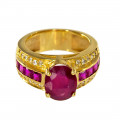 18K Gold Ring adorned with a Oval Ruby, a tow of square cut Rubies and two rows of Diamonds