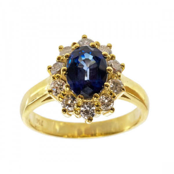 18K Gold Ring adorned with a Ceylon Sapphire and Diamonds