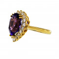 18K Gold Ring adorned with an Amethyst and a Diamond Halo