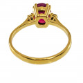 18K Gold Three-stone Ring adorned with a Ruby and two Diamonds