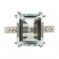 White Gold Solitaire Ring adorned with an Aquamarine and Diamonds