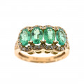 18K Gold Ring adorned with Emeralds and Diamonds