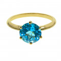 14K Gold Solitaire Ring adorned with a Blue Topaz