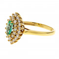 Gold Ring adorned with a Navette-cut Colombian Emerald surrounded by Diamonds