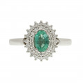 White Gold Emerald Ring with a Diamond Halo