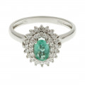 White Gold Emerald Ring with a Diamond Halo