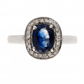 Blue Sapphire Ring with a Diamond Halo