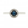 White Gold Sapphire Solitaire Ring with a Diamond Halo