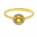 Gold Ring adorned with a Yellow Sapphire and a Diamond Halo