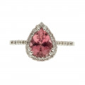 White Gold Solitaire Ring adorned with a Pink Sapphire and a Diamond Halo