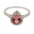 White Gold Solitaire Ring adorned with a Pink Sapphire and a Diamond Halo